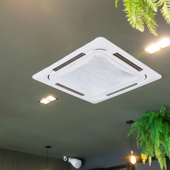 modern ceiling mounted cassette type air conditioning system in coffee shop