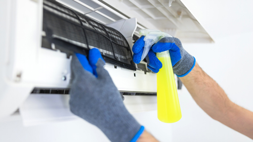 air conditioning service and maintenance, fixing AC unit and cleaning the filters